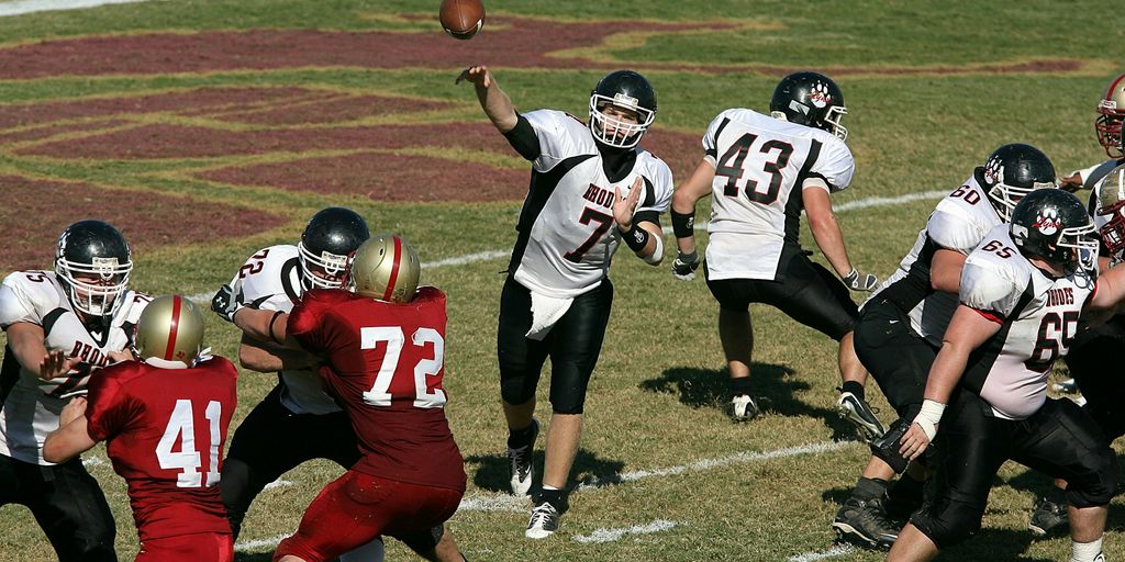 group of men playing football